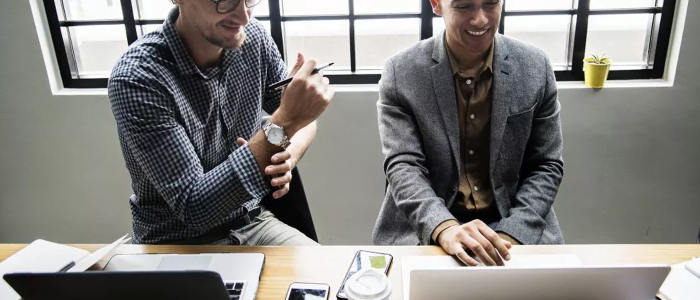two people at desk