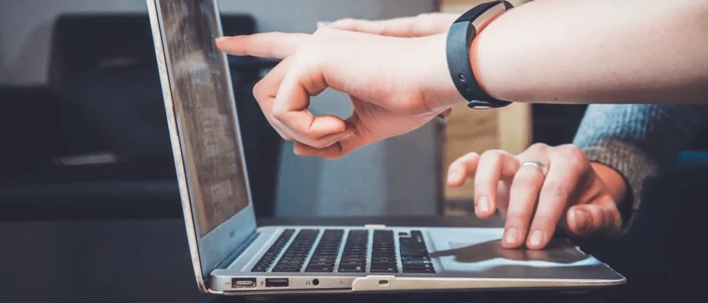 pointing at macbook screen