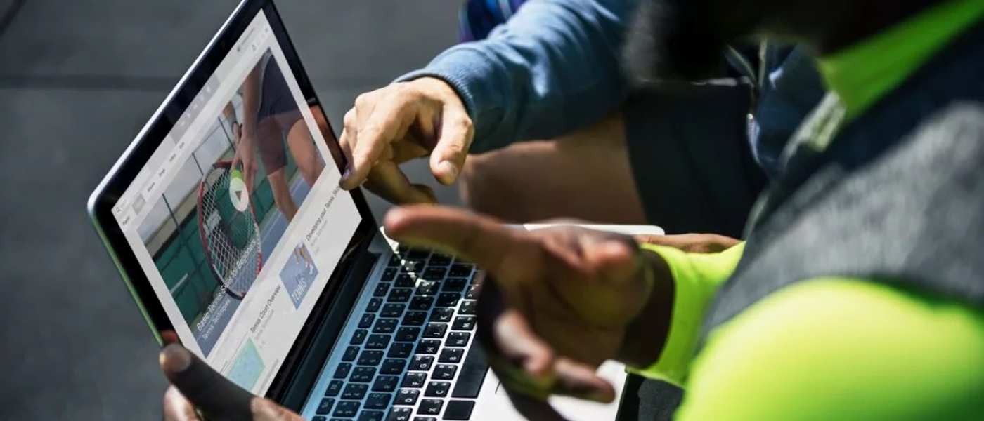 using laptop watching a video