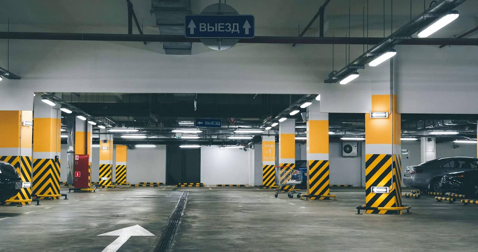 Cars parked in a multi-level parking garage