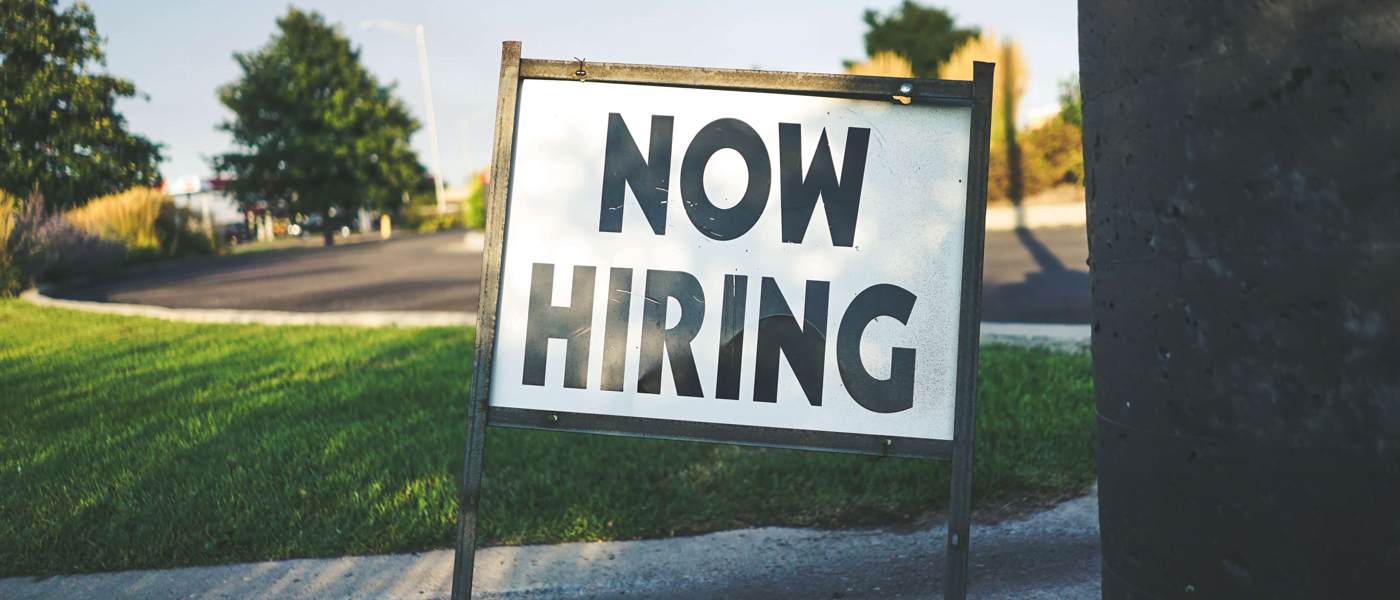 now hiring sign