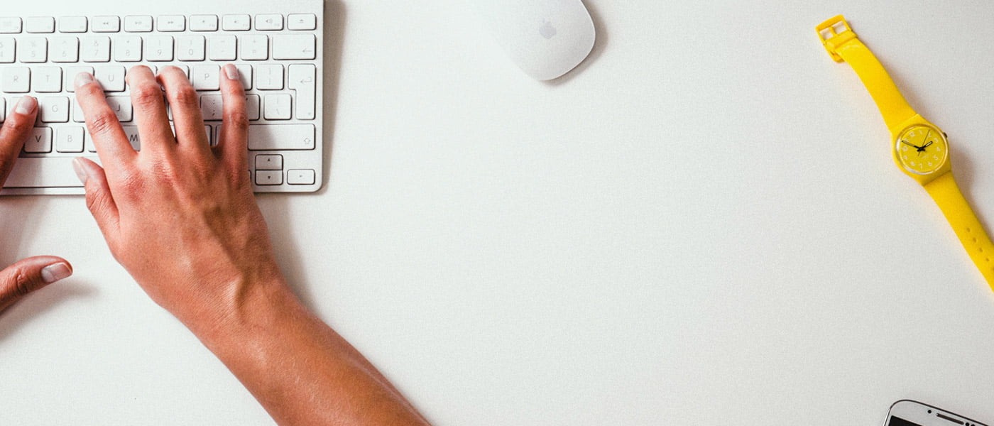 person using keyboard