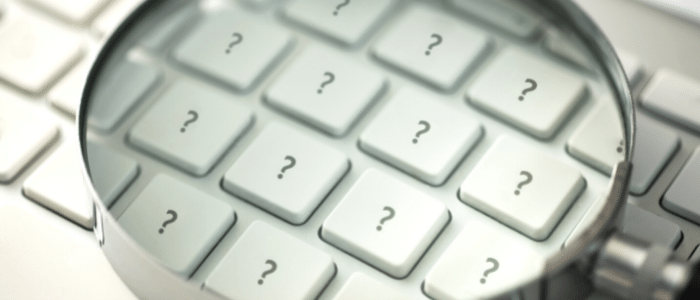 Magnifying glass on Keyboard of ?s